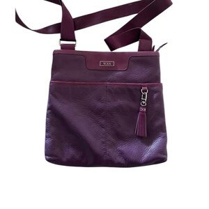 Tumi | Plum leather Crossbody travel Bag